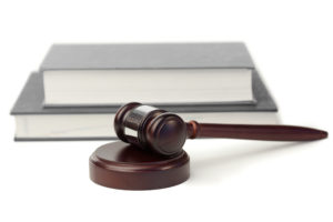 Denied insurance claims attorney book and gavel